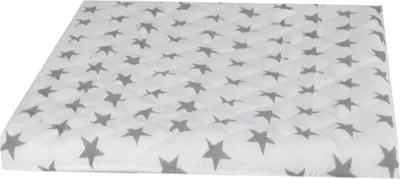 A quilted mattress cover with a star pattern.