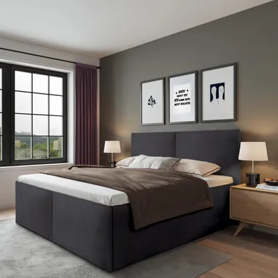 A bedroom scene with a bed as the main focus.