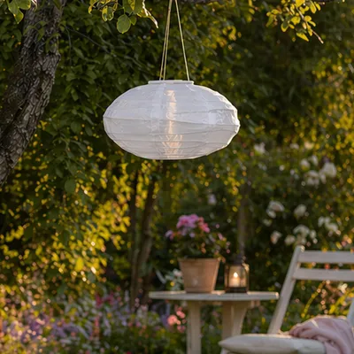Produktbild von LED Solar Lampion oval - warmweiße LED - H: 19cm - D: 35cm - Lichtsensor - weiß