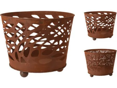 Three rusty metal planters with cut-out designs are displayed against a white background.