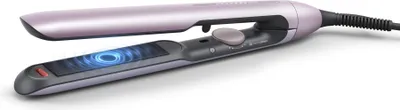 A close-up, studio shot of a silver and purple hair straightener against a white background.