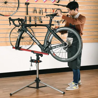 Imagen del producto de Soporte para reparación de bicicletas - Estructura ajustable de aluminio - Capacidad de carga de 35 kg