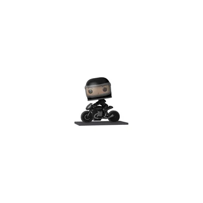 A Funko Pop! vinyl figure of Selina Kyle on a motorcycle.