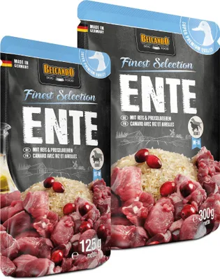 Two bags of dog food are shown, with a close-up view of the ingredients.