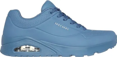 A side view of a blue Skechers sneaker.
