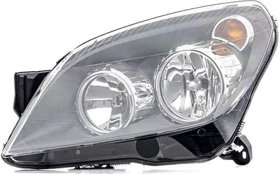 Produktbild von HELLA Scheinwerfer Links für OPEL Astra H Caravan (A04) 1EG 270 370-311