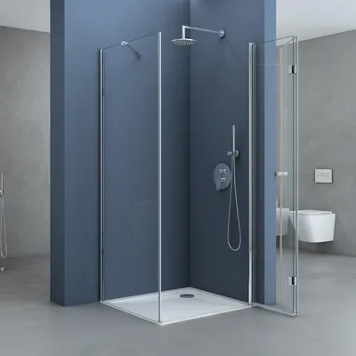 A modern bathroom with a corner shower cabin.