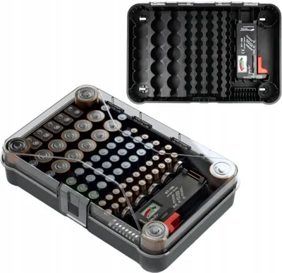 A battery organizer filled with various sizes of batteries, with a battery tester visible.