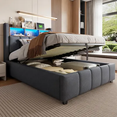 A modern bedroom with a bed featuring a storage compartment and LED lighting.