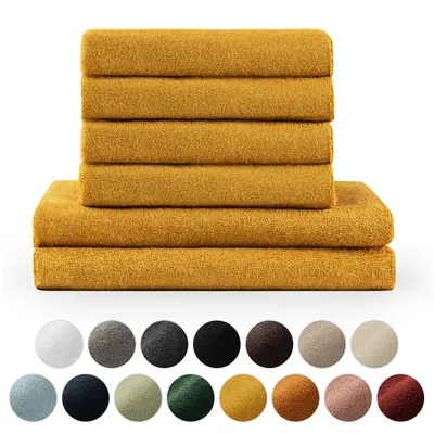 A stack of yellow towels and a row of color swatches.