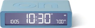 A light blue digital alarm clock with a digital display showing the time.