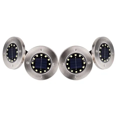 Four solar-powered garden lights arranged in a row.
