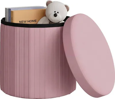 A pink storage ottoman with its lid open, revealing a teddy bear and books inside.