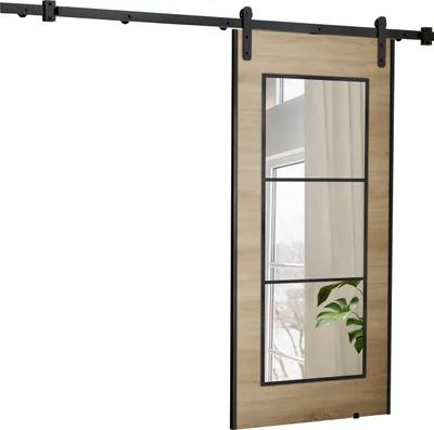 A sliding door with a wood grain finish and a mirrored panel, mounted on a black metal track.