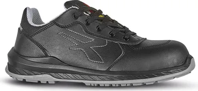 A black safety shoe with gray accents is shown against a white background.