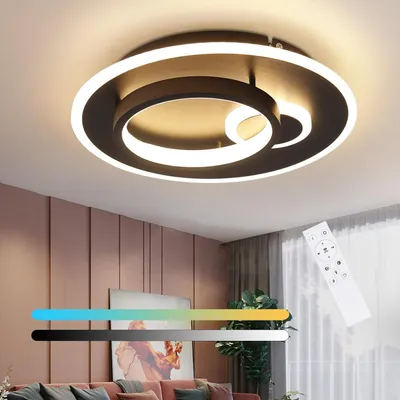 A modern LED ceiling light fixture with a remote control and color temperature options displayed.