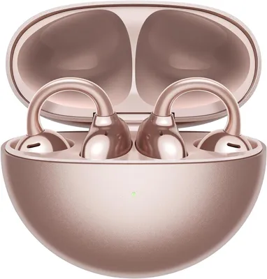 A pair of rose gold wireless earbuds in their charging case.