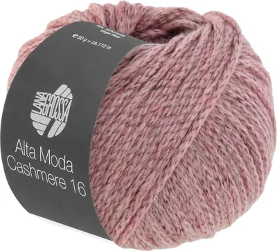 A ball of pink yarn with a dark gray label wrapped around it.