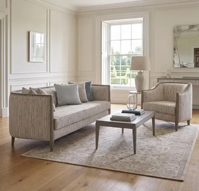 Immagine prodotto di Divano e poltrona beige per soggiorno, con gambe in legno