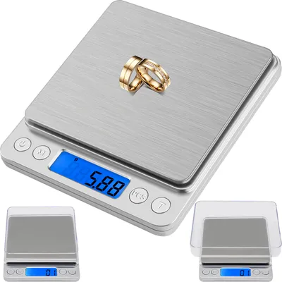 A digital scale with two gold rings on it, with two smaller scales shown in the corners.