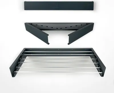 Three parts of a wall-mounted drying rack are displayed against a white background.