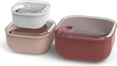 Three food storage containers of different sizes and colors are arranged in a group.