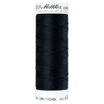 A spool of black thread on a white background.