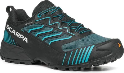 Trailrunning-Schuh "Ribelle Run XT GTX" von Scarpa in Schwarz mit blauen Akzenten.