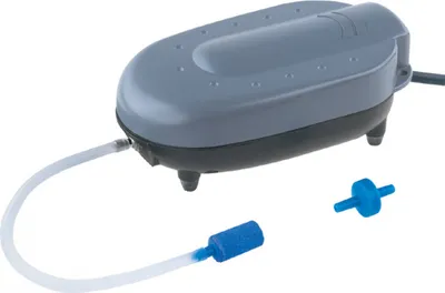 A product shot of an aquarium air pump with accessories.