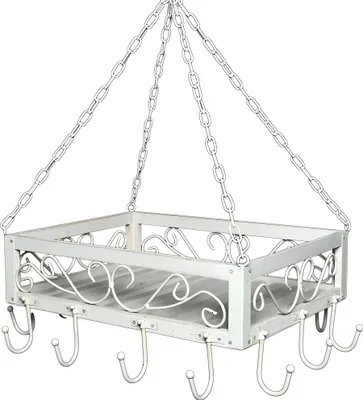 A white hanging pot rack with decorative scrollwork on the sides.