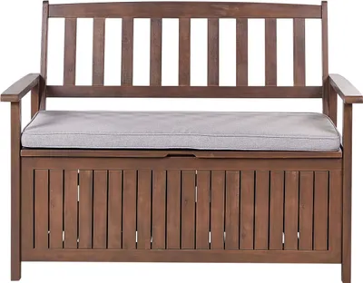 Zdjęcie produktu dla BELIANI Ławka ogrodowa ze schowkiem ciemnobrązowy akacjowe szara poduszka 120 x 60 cm siedzisko dla 2 osób na taras do ogrodu rustykalny styl