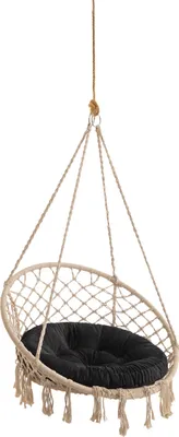 A hanging chair with a black cushion, suspended by ropes against a white background.