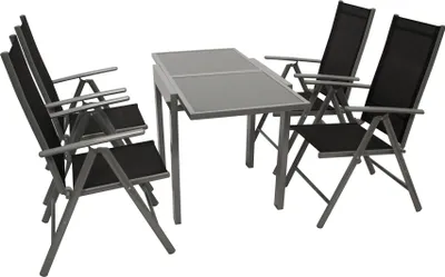 A patio dining set with four chairs and a table, displayed on a white background.