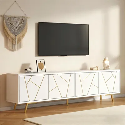 Image de Meuble TV bas Merax à 4 portes et 5 pieds métalliques, grand meuble TV avec espace de rangement en aggloméré, meuble de salon pour téléviseurs jusqu'à 85 pouces, blanc + doré