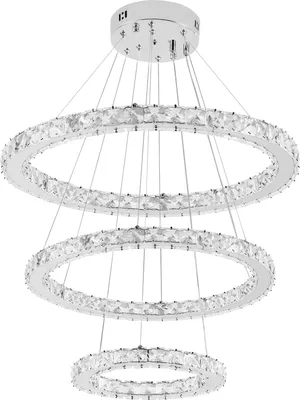A multi-tiered crystal chandelier with three rings.