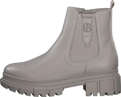 A single beige Chelsea boot with a platform sole is shown from the side against a white background.