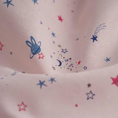 Productafbeelding van Chambray katoen, sterrenprint, roze