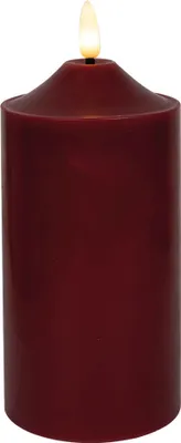 A close-up product shot of a red LED candle.