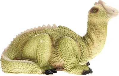 A toy dinosaur is shown lying down on a white background.