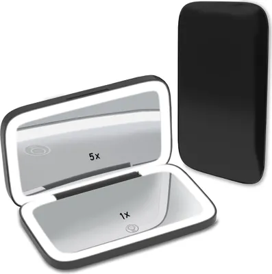 A black cosmetic mirror with LED lights, shown open and closed.