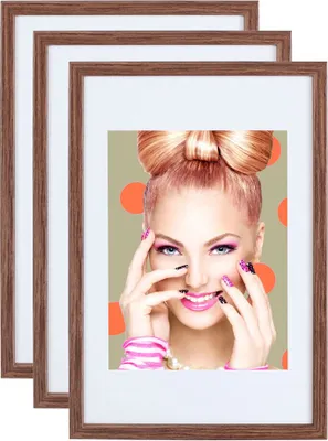 A collage of three picture frames, with the front frame displaying a vibrant image of a woman with dramatic makeup and hairstyle.