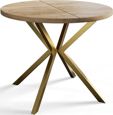 A round wooden dining table with a gold metal base, shown on a white background.
