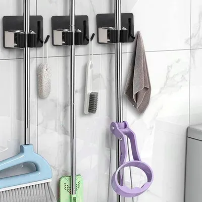 Produktbild von Unyqoos® Selbstklebender Besen- & Mophalter aus Edelstahl ohne Bohren, flexibler Stielhalter mit automatischen Klemmen und Zusatzhaken