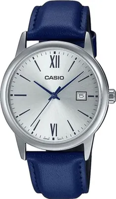 A close-up studio shot of a Casio men's watch with a silver dial and a blue leather strap.