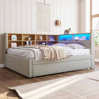 A bedroom scene featuring a bed with a built-in bookshelf headboard.