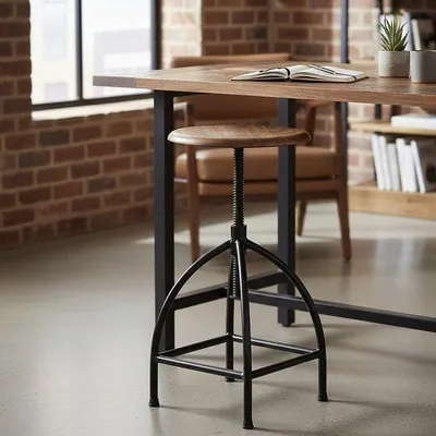 Produktbild von Broste Copenhagen Drehhocker Sire Mangoholz Eisen schwarz