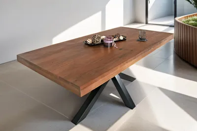 Produktbild von Esstisch 140 x 80 cm Rio, Esszimmertisch nussbaumfarben, Akazienholz massiv, Spider-Gestell aus Metall Schwarz, gerade Kanten