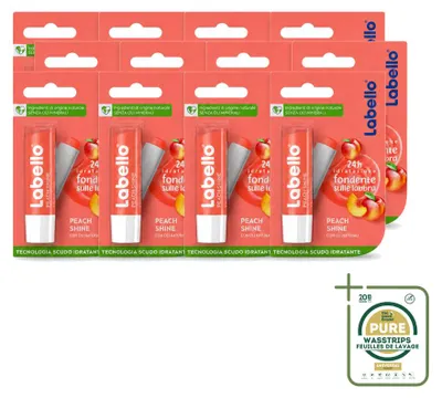 Productafbeelding van 12 x Labello Fruity Peach Shine veganistische lippenbalsem met koraalglanzende finish - Voorraadverpakking - 12 stuks