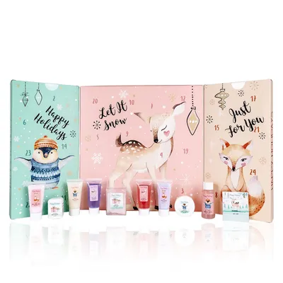 A Christmas advent calendar with a winter theme, featuring illustrations of animals and holiday greetings. Small cosmetic products are displayed in front of the calendar.