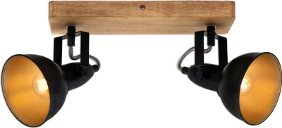 A close-up studio shot of a black and wood ceiling light fixture with two adjustable spotlights.